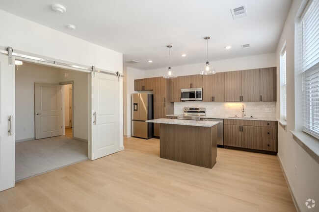 1BR, 1BA - 566 SF - Primrose Kitchen/Livingroom - Meridian at Wylie - 55+ Affordable Apartments