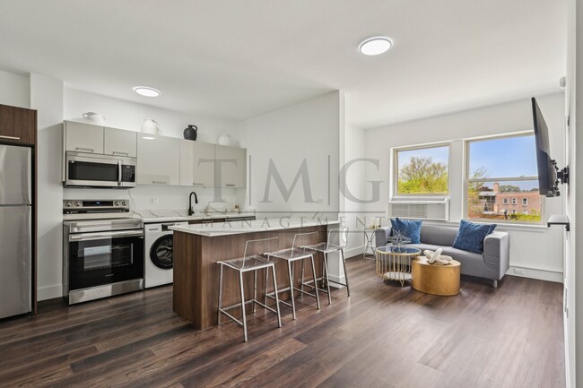 Foto del edificio - Modern 1 Bed in Andersonville: Luxe Kitchen & In-Unit Laundry