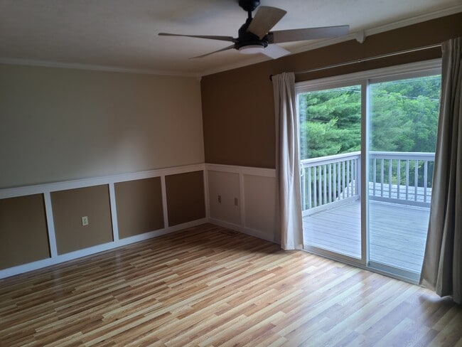living room and rear deck - 1528 Old Oak Ln