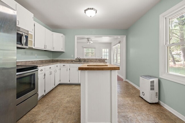 Photo - Ranch Three Bedrooms with Fenced in Yard Available April - Move in Ready! House