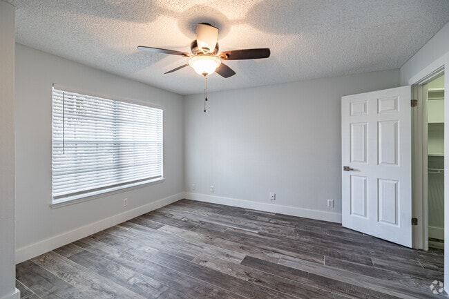 3BR 2BA - 1108SF Master Bedroom - South Bay Plantation Apartments