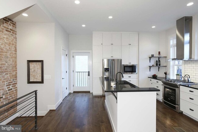 View of Kitchen and Downstairs Railing - 401 M St NW