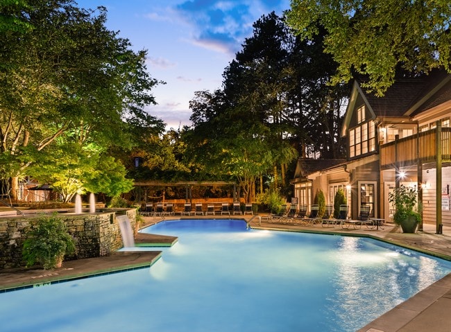 Pool View of Leasing Center Twilight - Calibre Woods Apartments