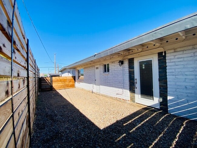 Building Photo - Spacious Design Meets Modern Living in thi...