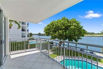 Building Photo - 9250 W Bay Harbor Dr