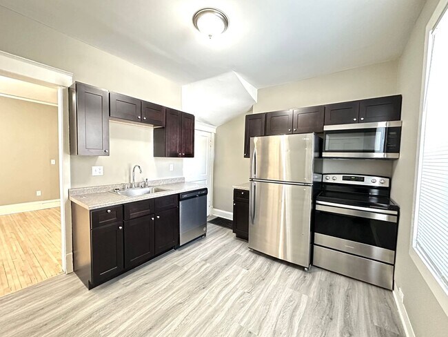 Building Photo - AVAILABLE JUNE - Beautifully Renovated 4 B...