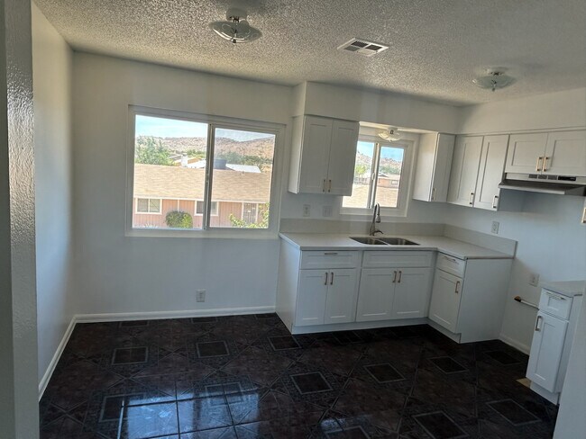 Remodeled Kitchen/Dining Area - 15481 Straight Arrow Rd