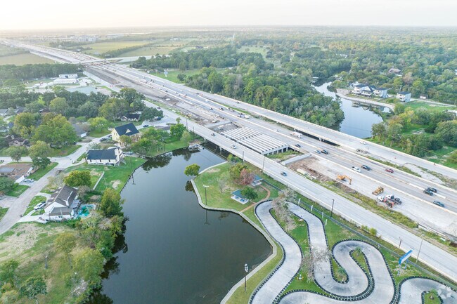 Dickinson Bayou winds underneath Interstate 45 in Dickinson, Texas.