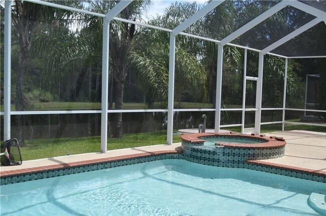 Building Photo - Stunning 5 bedroom 3 Bath Pool Home