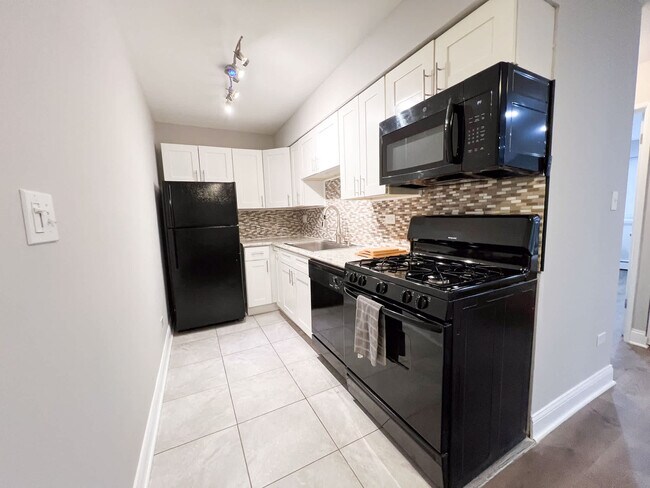 Foto del edificio - 3161 N Cambridge Ave