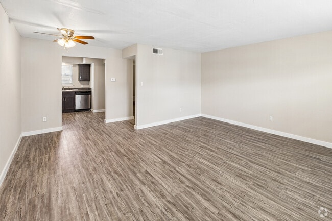 3BR, 2.5BA - 1,350SF - Living, Dining and Kitchen - Charleston Apartments