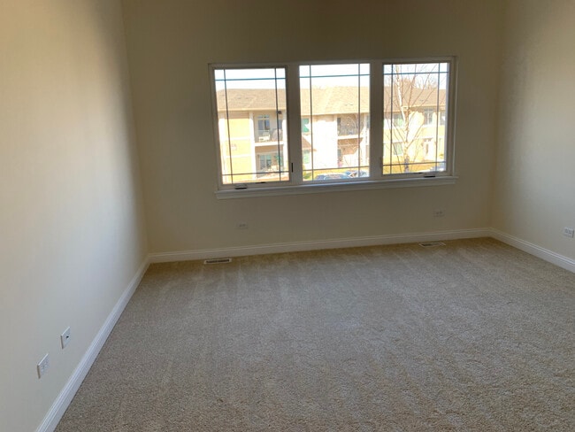 Master Bedroom (louvered plantation style shades have since been installed) - 614 Goldeneye Cir