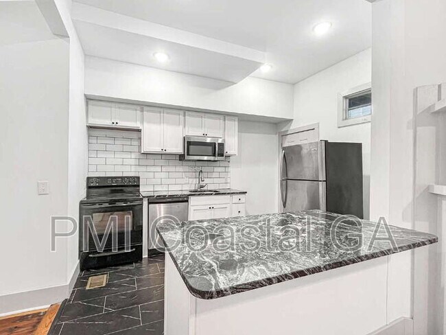 Foto del edificio - 310 W 42nd St