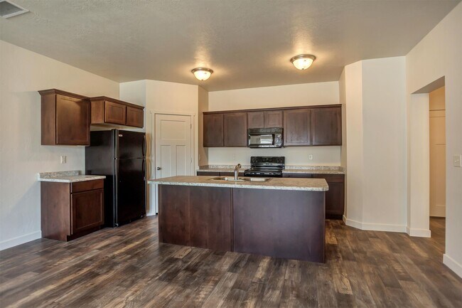 Foto del edificio - 5647 Island Ridge Dr