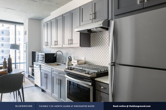 Building Photo - Four50, 450 W Belmont Ave