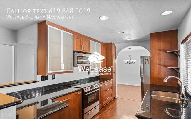 Building Photo - Charming 4-Bedroom Home with Fenced Yard, ...