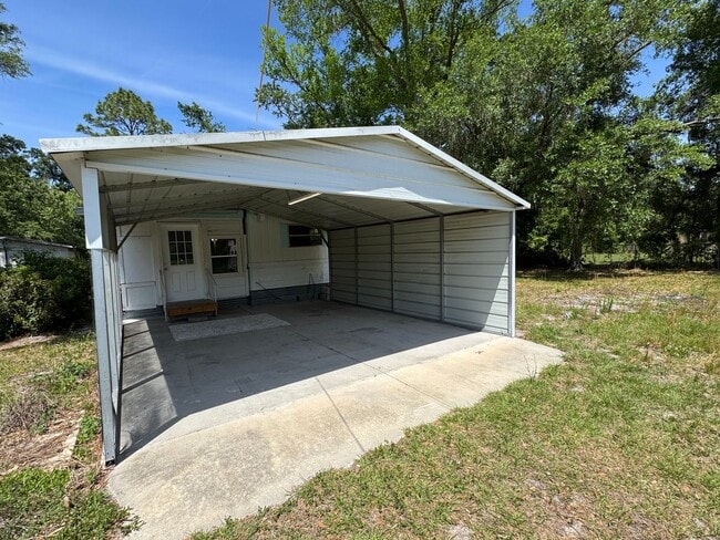 Building Photo - 2BR/1BA Mobile Home on ½ Acre – Pet-Friendly – Lake City, FL