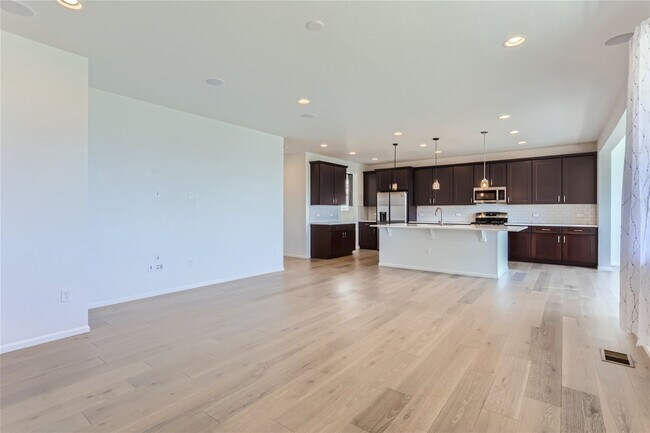 Foto del edificio - 3-Bedroom Home with Open Floor Plan, Private Balcony & Attached Garage