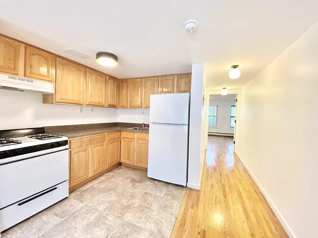 Building Photo - 61-25 Woodside Ave