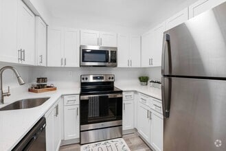 Building Photo - Breezes at Palm Aire