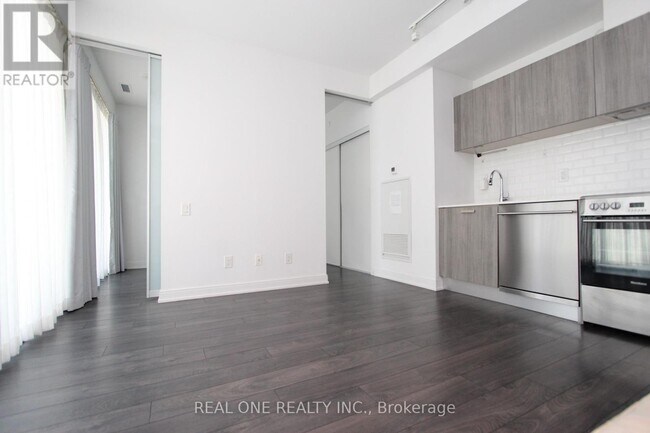 Building Photo - 50A-550 Charles St E