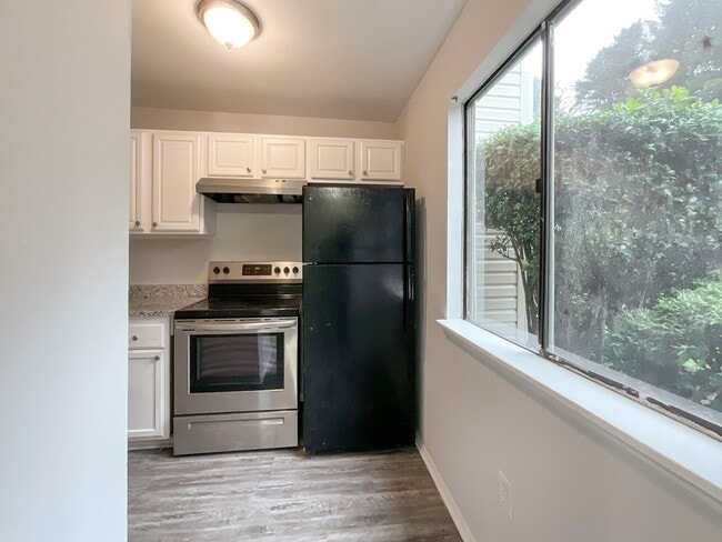 Photo - COMING SOON! Charming 2-Bed, 1.5-Bath Retr... Apartment