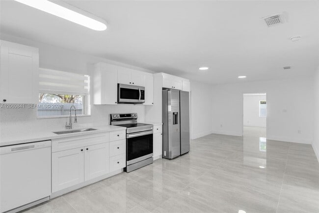 Building Photo - 9999 NW 25th Terrace
