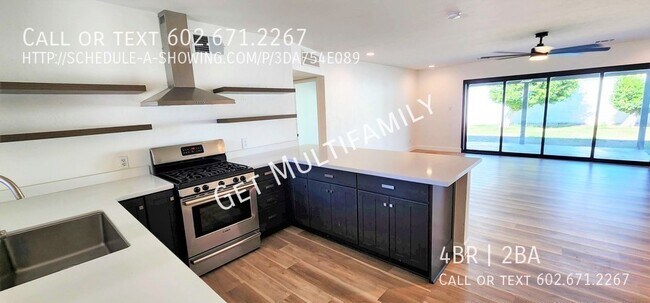 Building Photo - Stunning 4BR/2BA Home with Modern Amenitie...