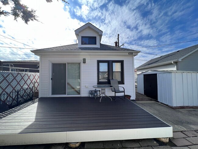 Front of house/deck - 4358 N Oak Park Ave