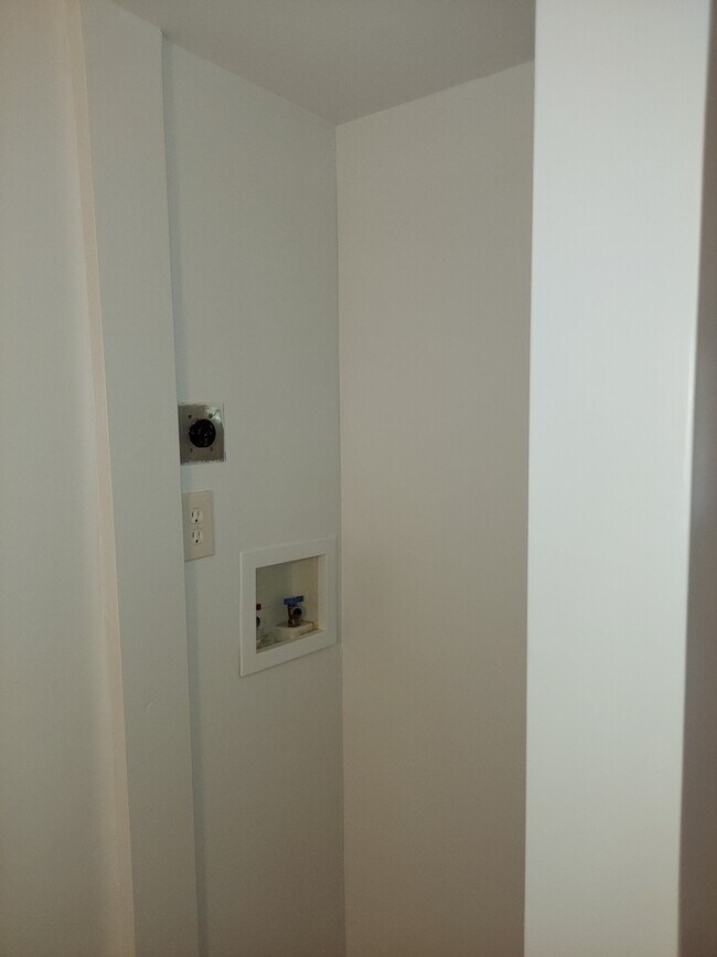 Laundry hookups (stacking) in half bathroom - 7088 Wildwood Cir