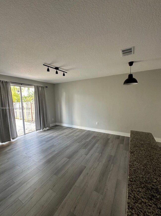 Building Photo - 10981 NW 48th Ter