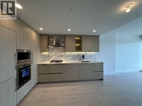 Building Photo - 4890 Lougheed Hwy