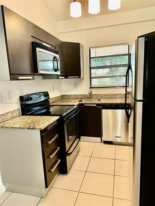 Building Photo - 11219 Royal Palm Blvd