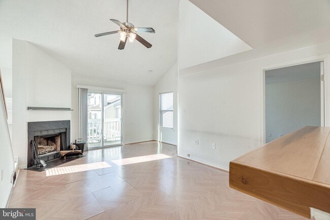 Building Photo - This two-bedroom, two-bathroom condo becko...