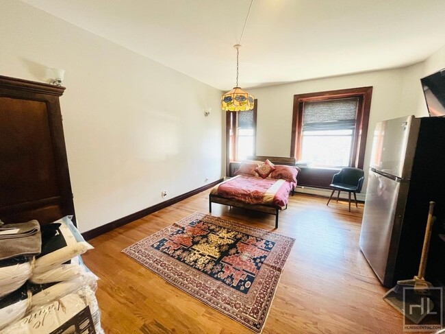 Building Photo - Your Bright & Cozy Fully-Furnished Studio ...