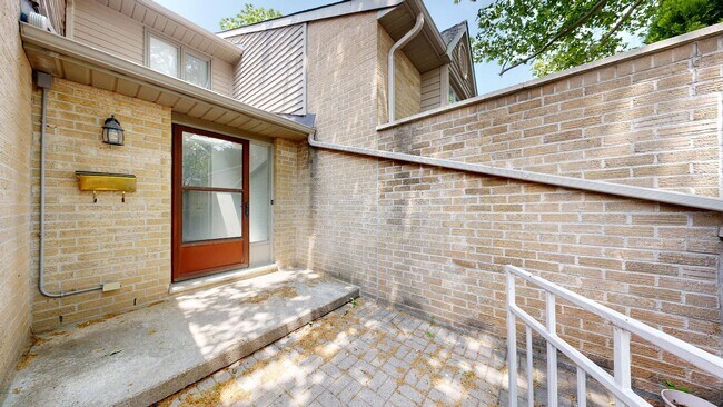 Building Photo - BRIGHT AND SPACIOUS 2 + DEN TOWNHOME NEAR MASONVILLE MALL