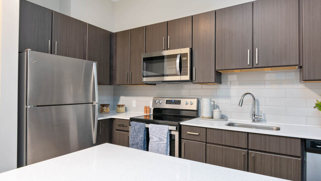 Kitchen with Stainless Steel Appliances - The Reserve at Burlington