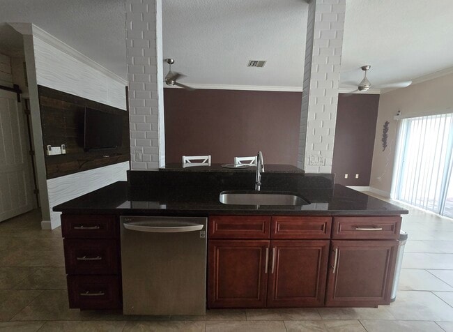 Kitchen looking into living room - 802 King Neptune Ln