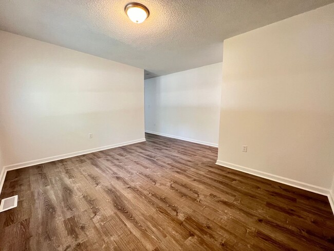 Building Photo - Sit Back, Relax. Your New View Awaits.