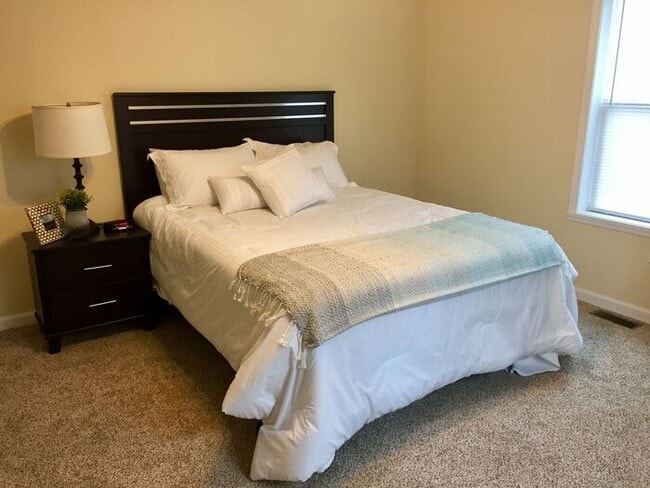 Building Photo - Settle in and cozy up in this comfortable lower-level two-bedroom apartment.