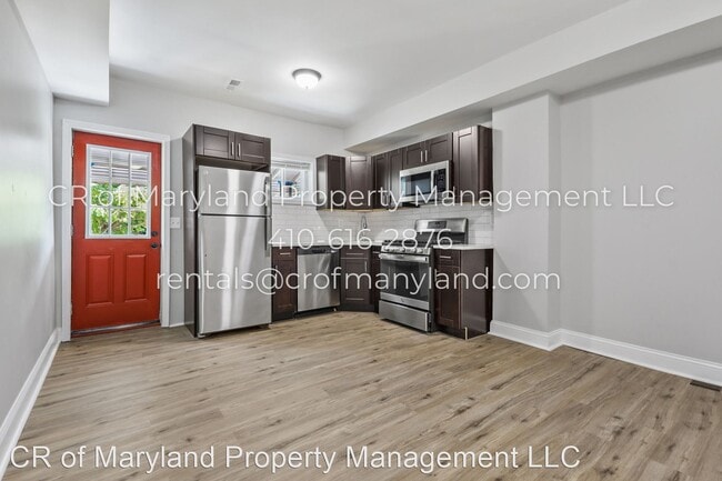 Building Photo - 2 br, 1.5 bath House - 611 E 30th St