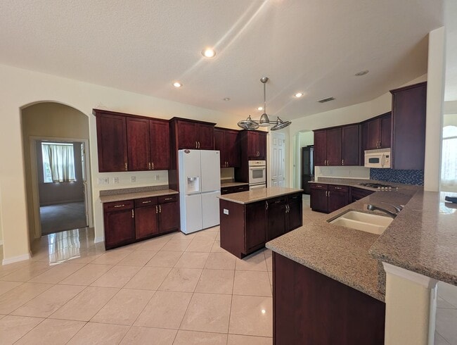 Building Photo - Luxurious 4/4/3 Lexington Pool Home in Pin...