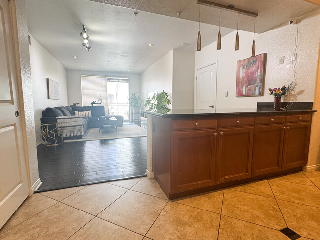 Unit entryway into gourmet kitchen - 3740 Santa Rosalia Dr