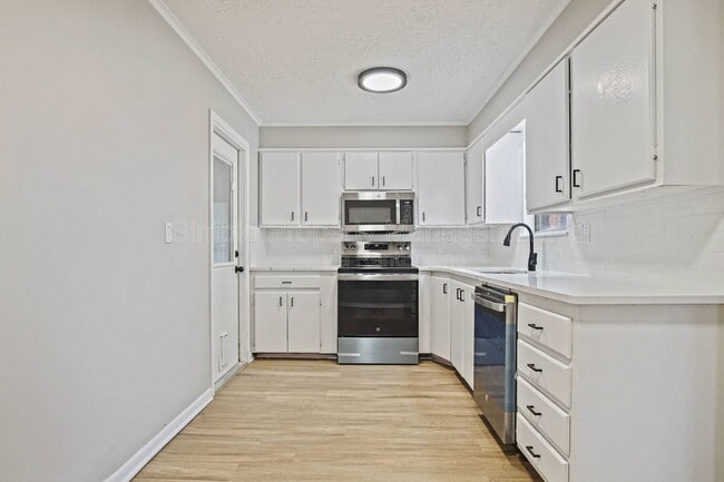 Building Photo - 1607 Denison Dr
