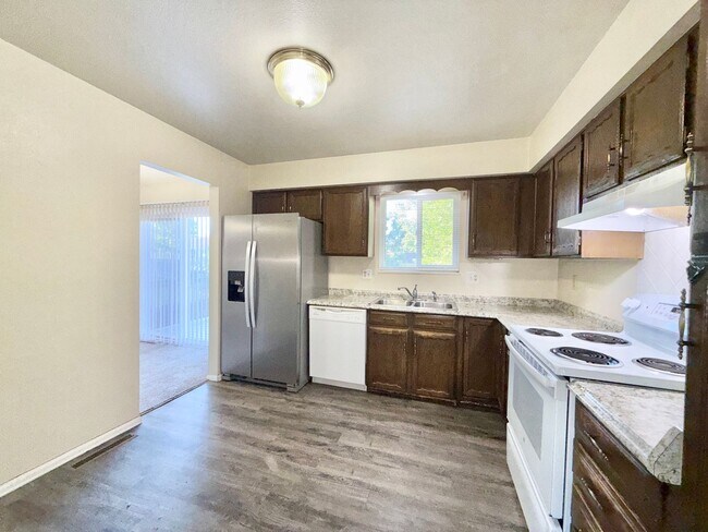 Building Photo - North-East Tri-Level Home w/ Newer Carpet!