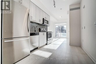 Building Photo - 57 Finch Ave W