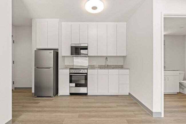 Building Photo - Brand New 2-bedroom, 1-bathroom at The Fla...