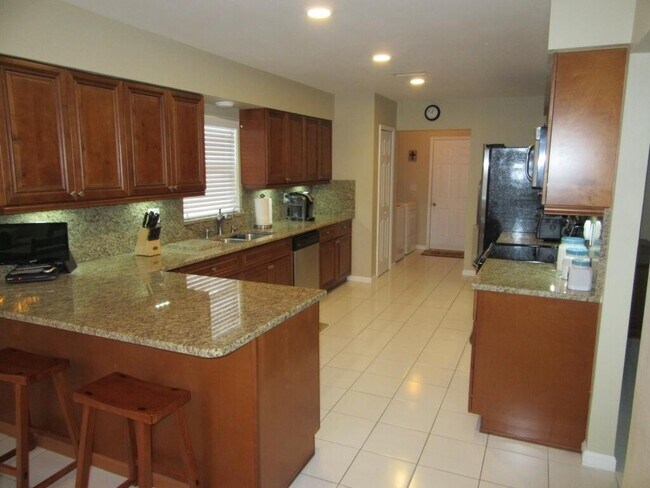 Foto del edificio - 10561 Greentrail Dr N