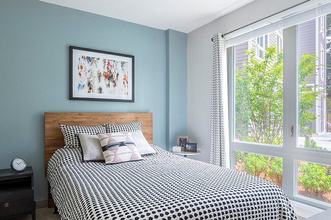 Bright living spaces with oversized windows - Velo Forest Hills Apartments