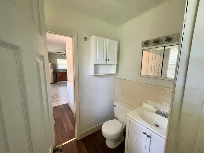 Building Photo - Huge Fenced Yard & All Hard Flooring